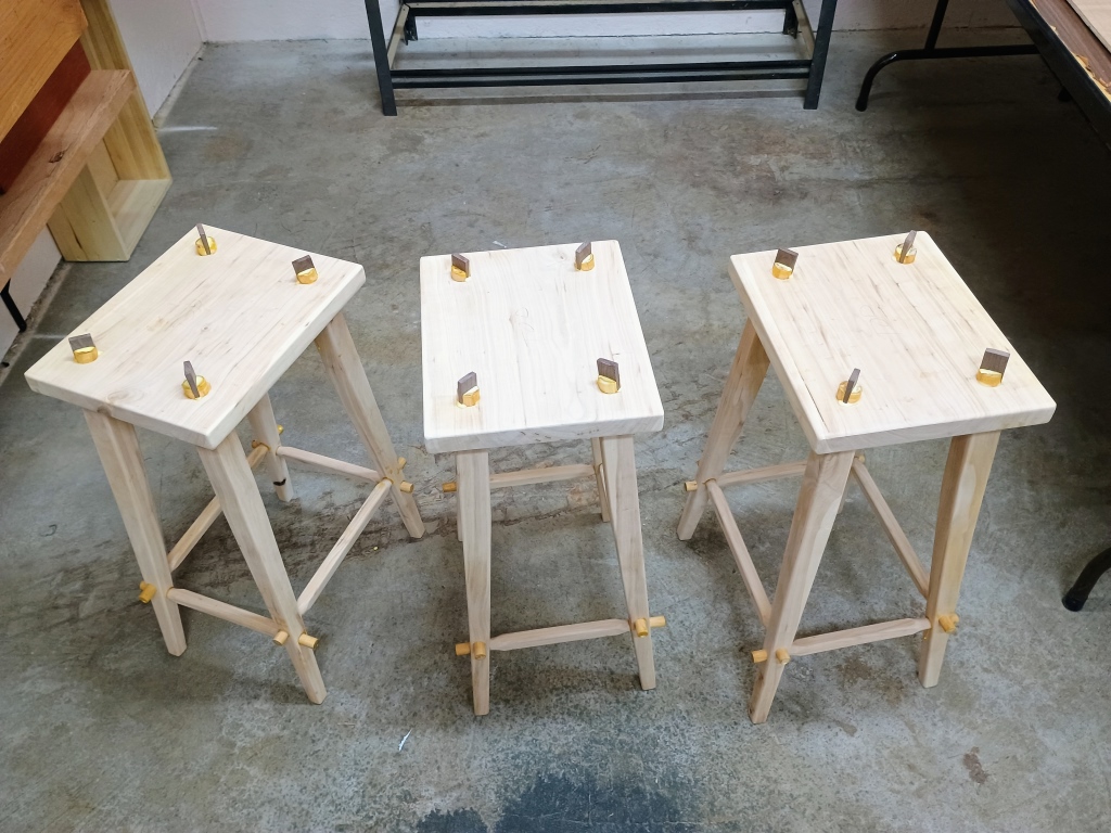 Rough, unfinished wooden stools