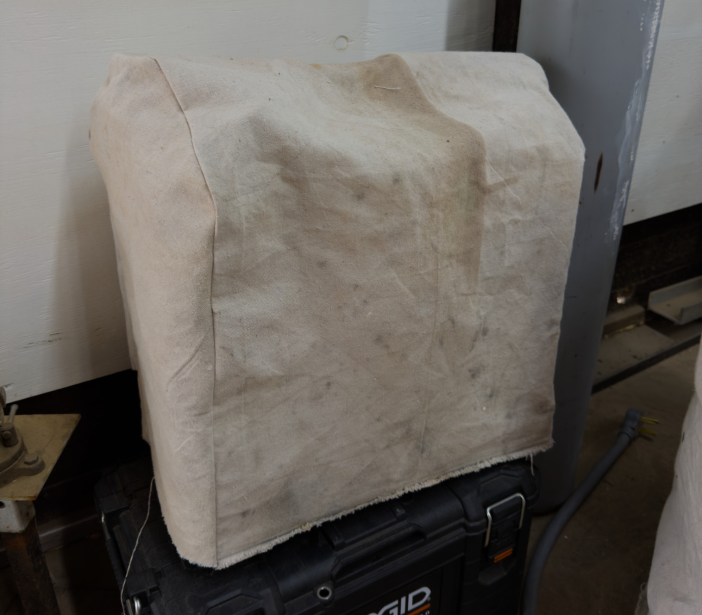 A welder covered by cloth